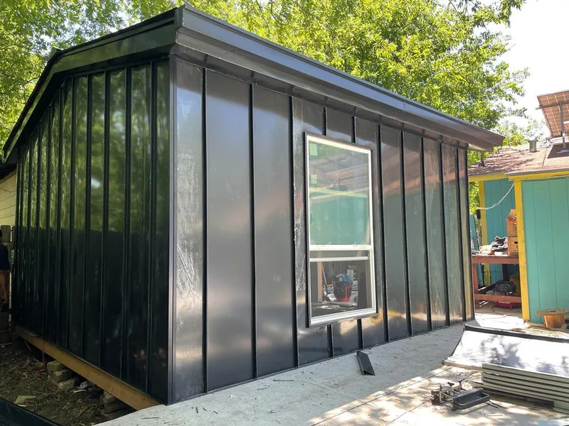 Black standing seam metal wall panels for Roof Inspection in Eastpointe