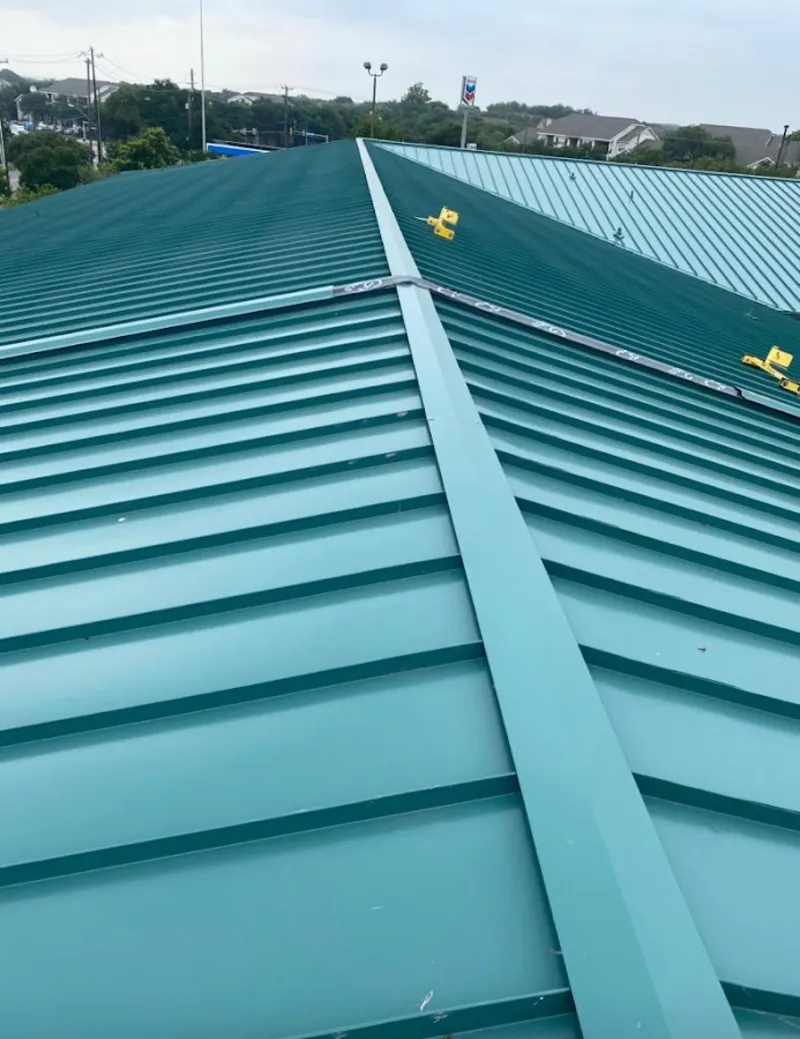 Green commercial metal roof ridge and valley for Metal Roof Repair in Eastpointe