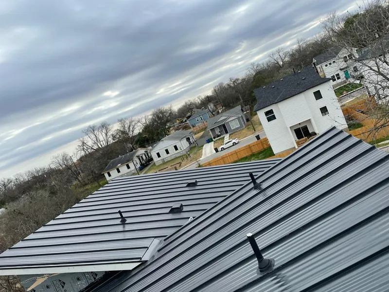 Standing seam metal roof panels with vents for Skylight Repair in Eastpointe
